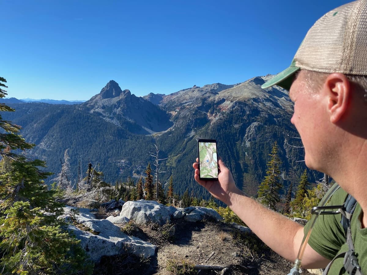 NAVIGATE: phone in the field, map + compass