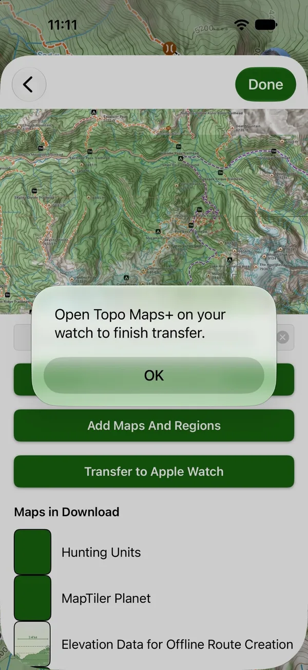 The message Open Topo Maps+ on your watch to finish transfer, with OK