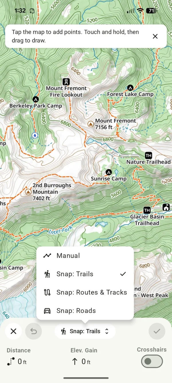 The snap mode menu open, showing Manual, Snap: Trails, Snap: Routes & Tracks, and Snap: Roads
