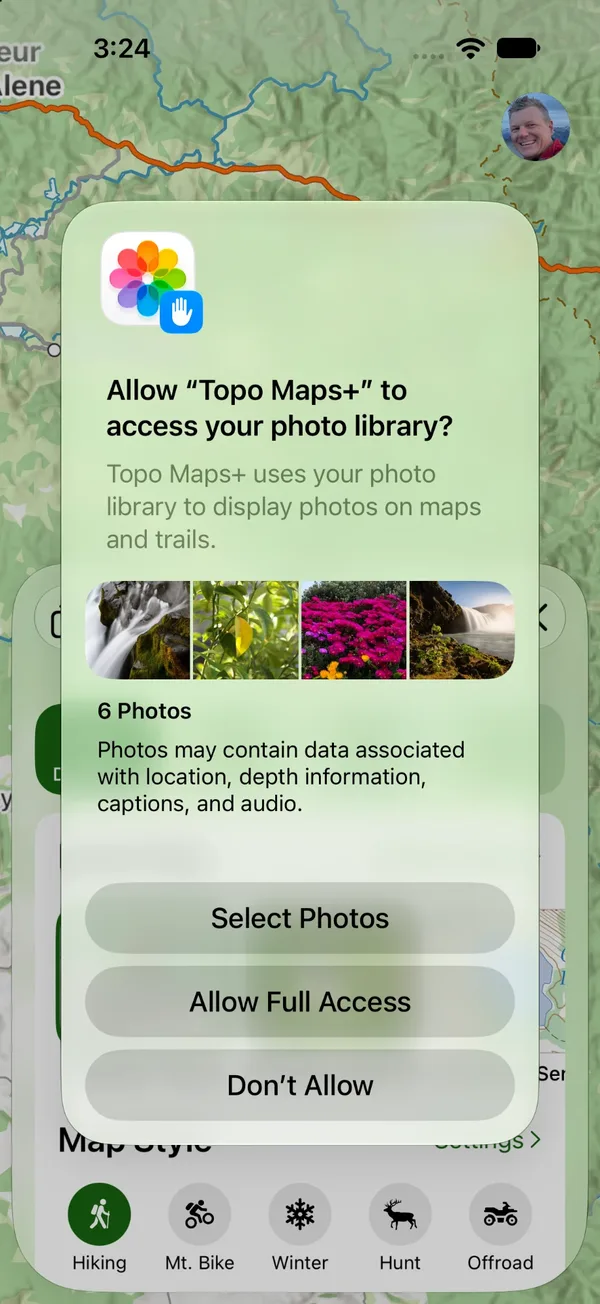 The system prompt asking to allow Topo Maps+ to access photos