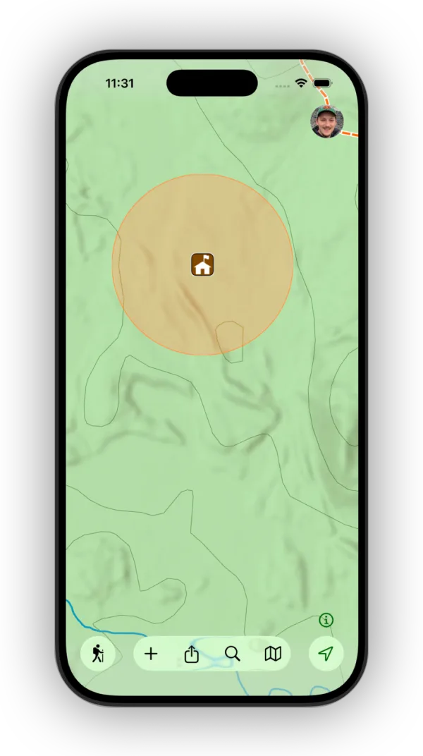An orange circle on the map around a waypoint with an alert